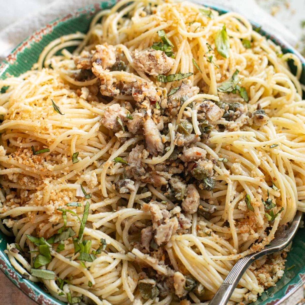 sardine pasta in a green bowl