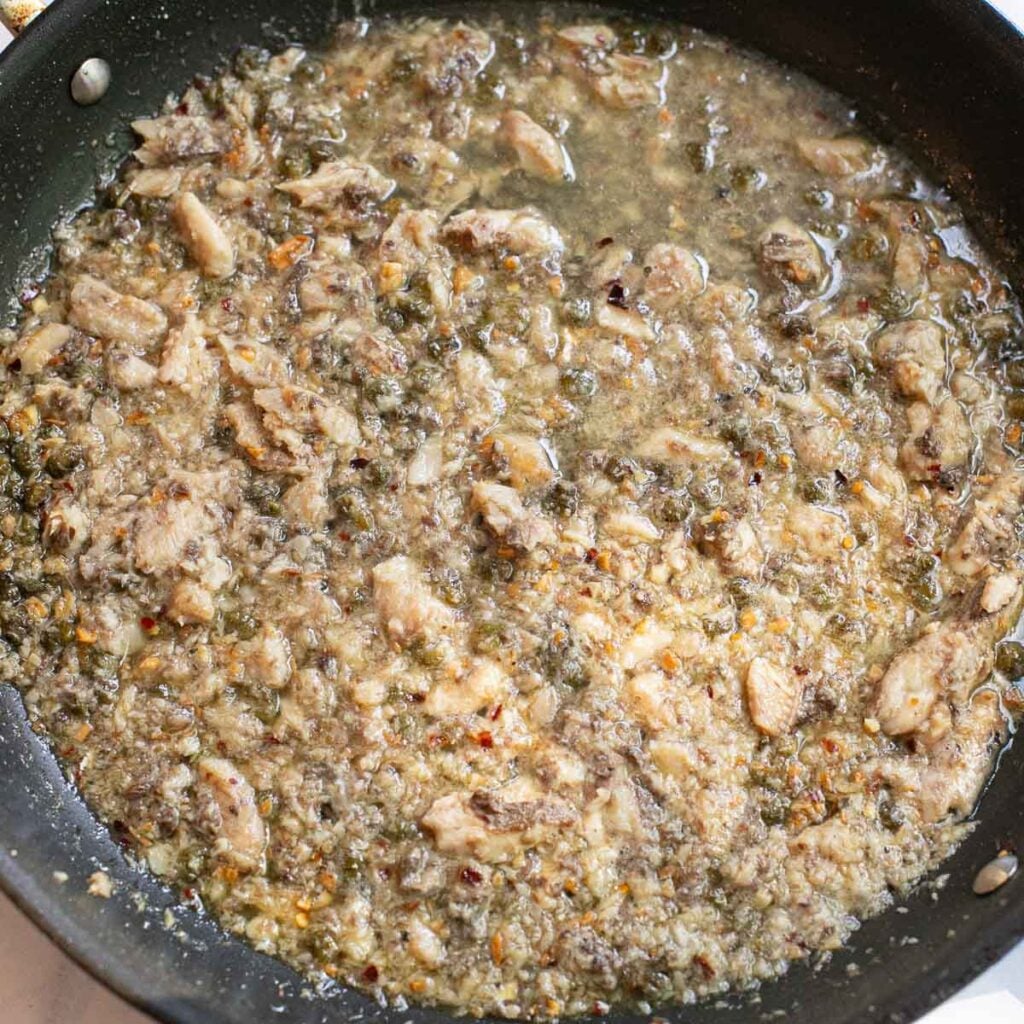 sardine pasta sauce cooking in a pan