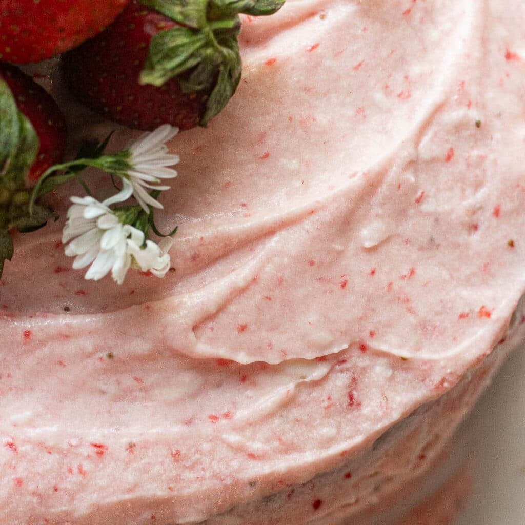 close up view of strawberry frosting