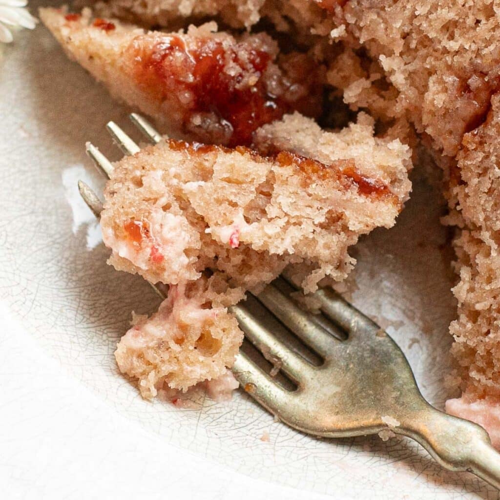 a forkful of strawberry cake
