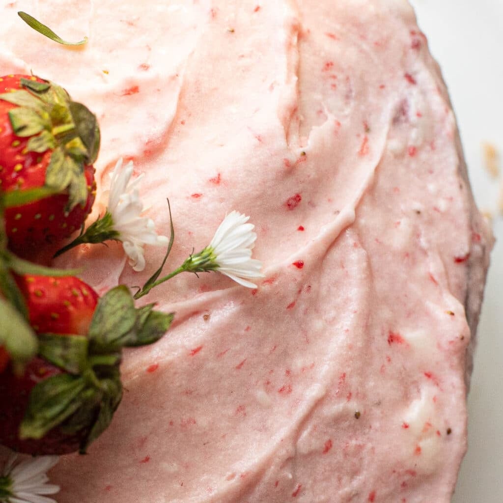 close up view of strawberry frosting