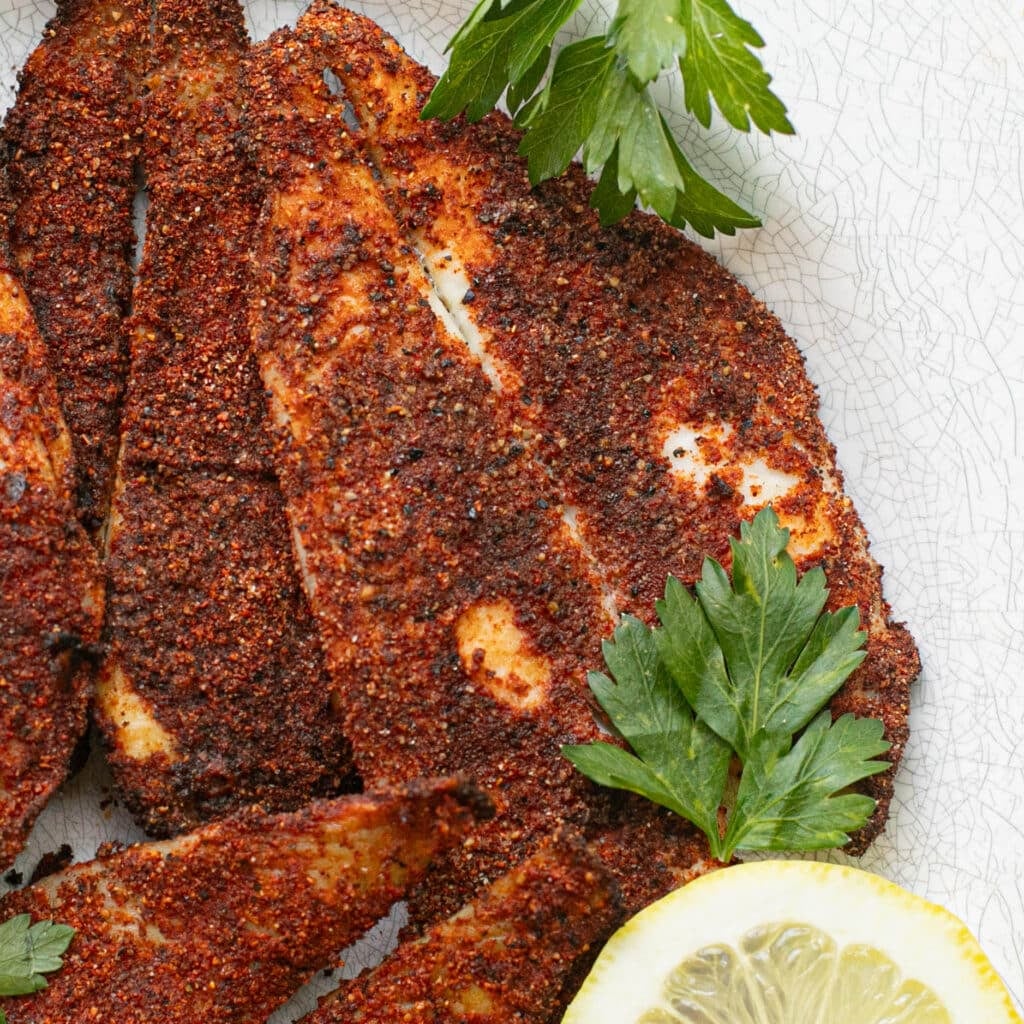 air fried tilapia on a white plate