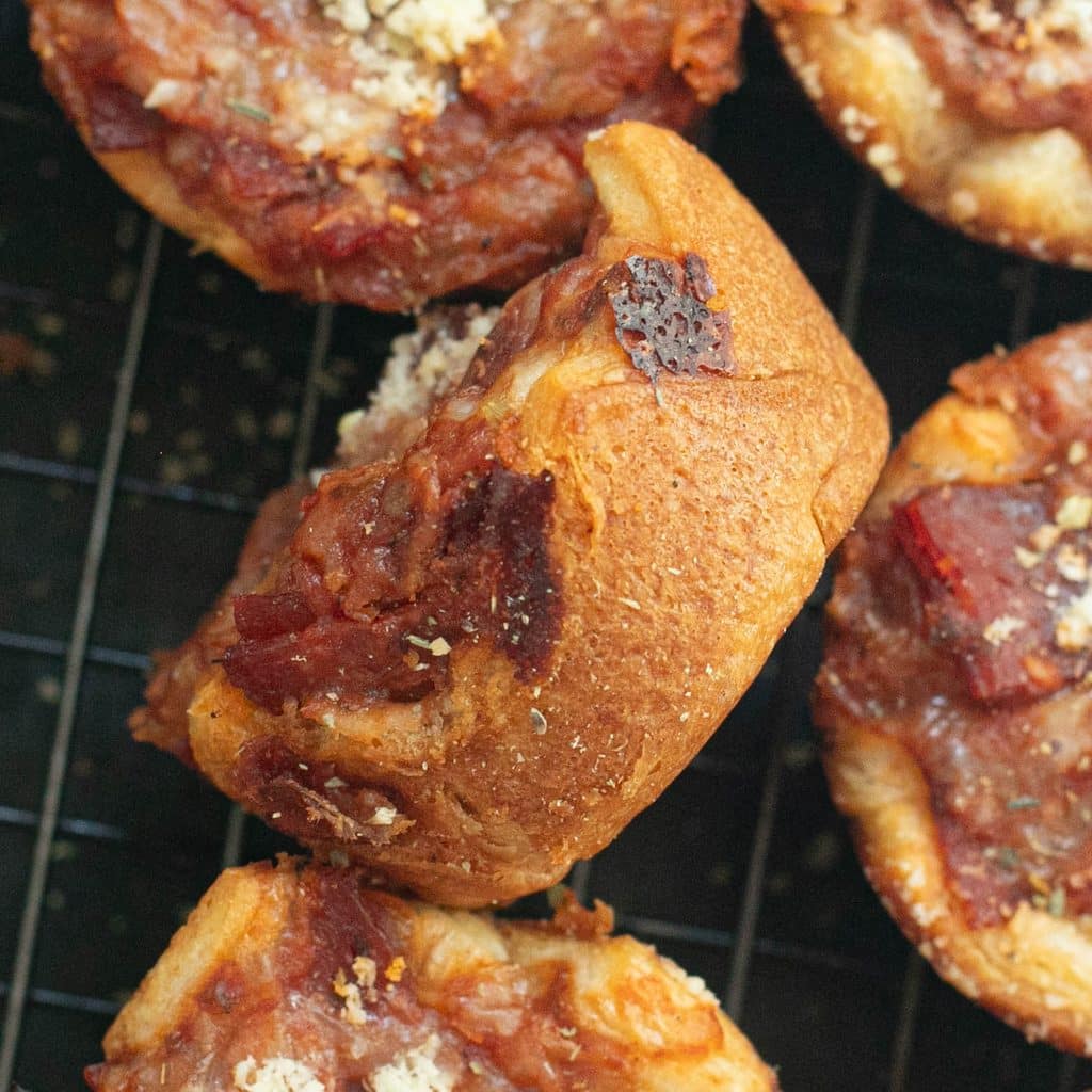 sideways view of a pizza muffin's crust