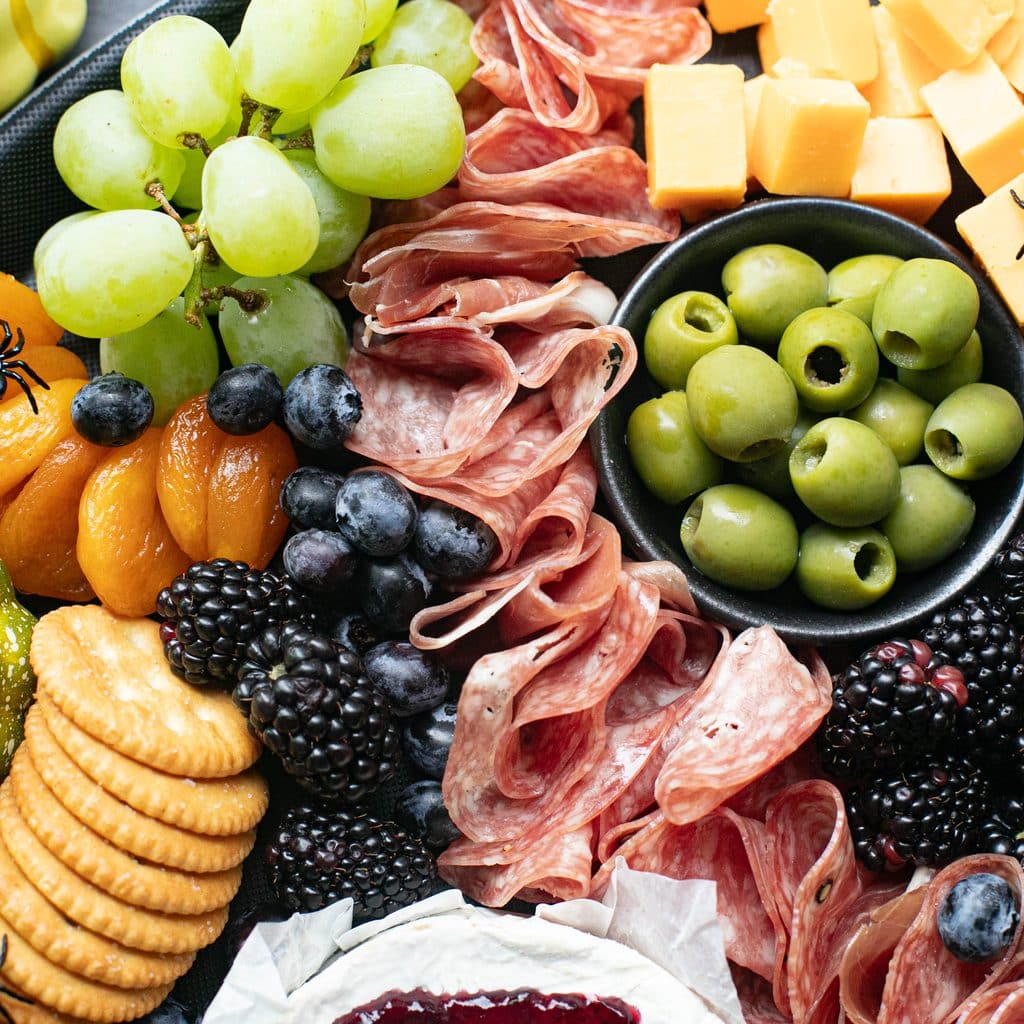 meats, fresh berries, green olives