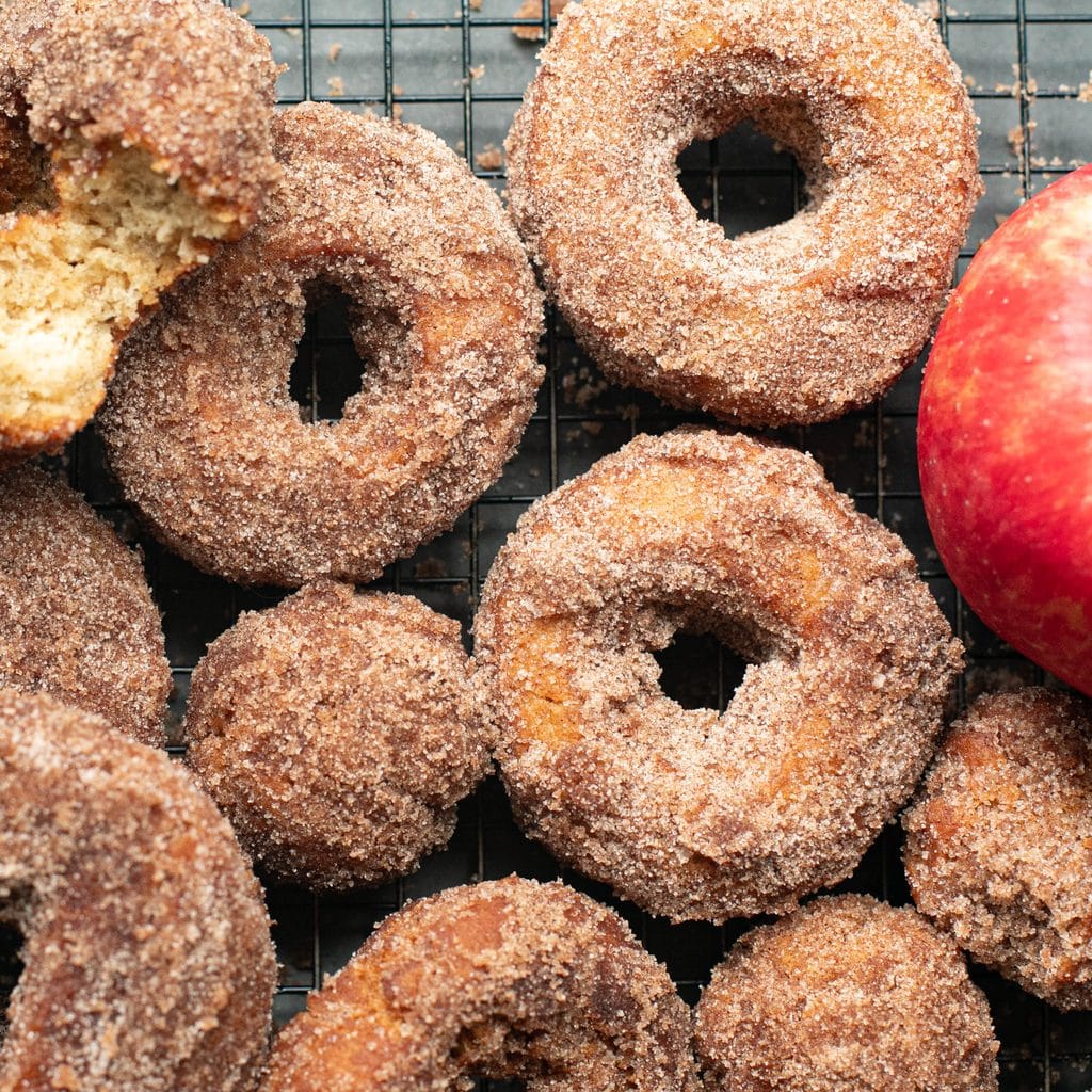 apple cider donuts on a wire rack