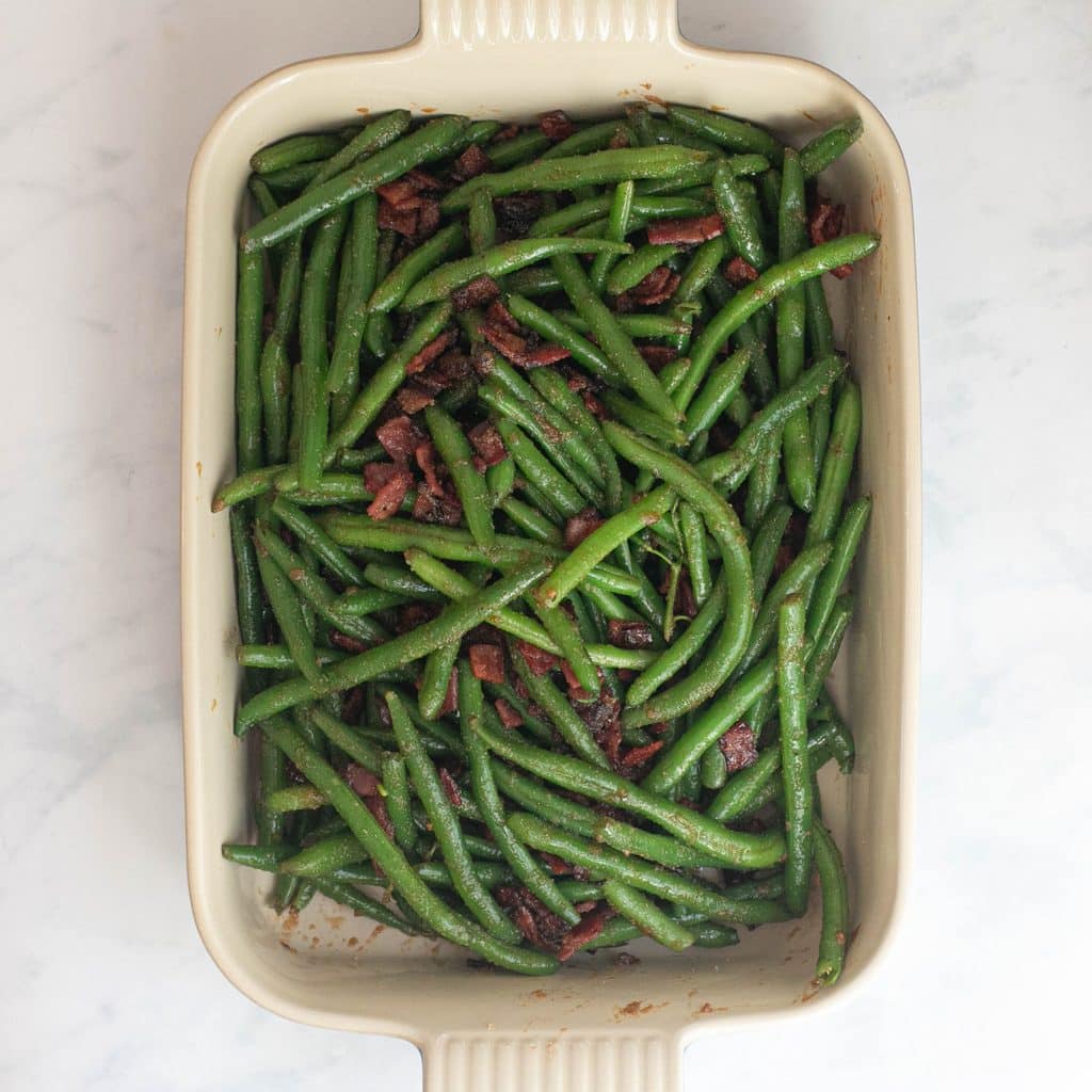 green beans and bacon in a baking dish