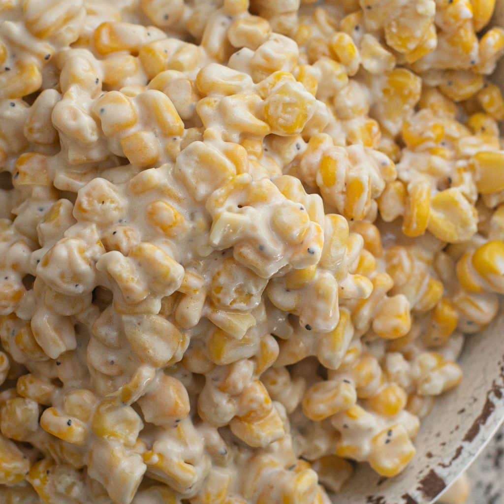 close up view of slow cooker creamed corn
