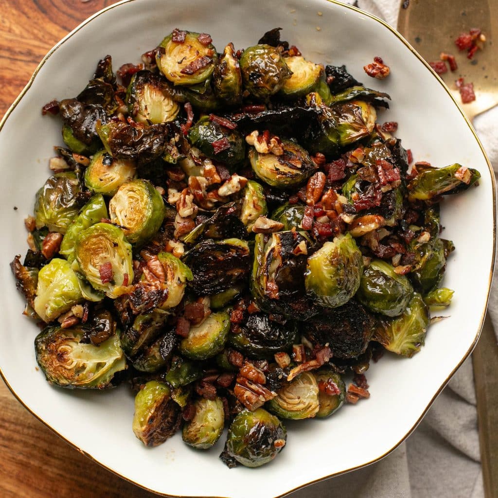 maple bacon Brussels sprouts in a white bowl
