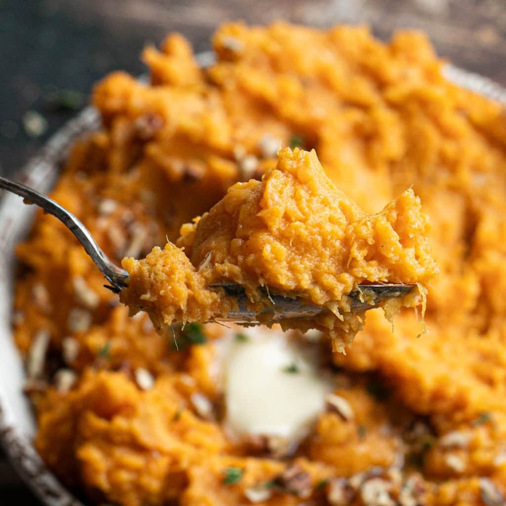 a large spoonful of mashed sweet potatoes