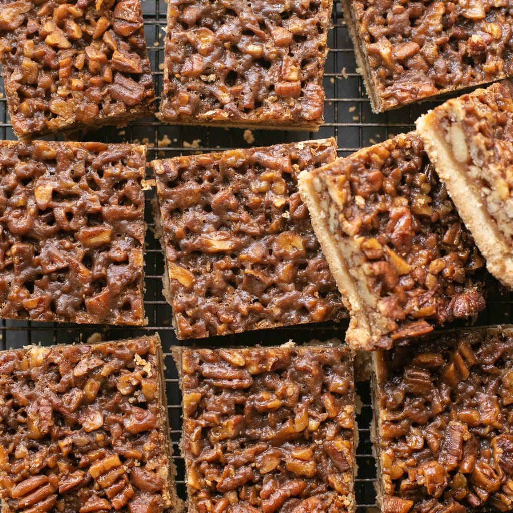 pecan pie bars on a wire rack
