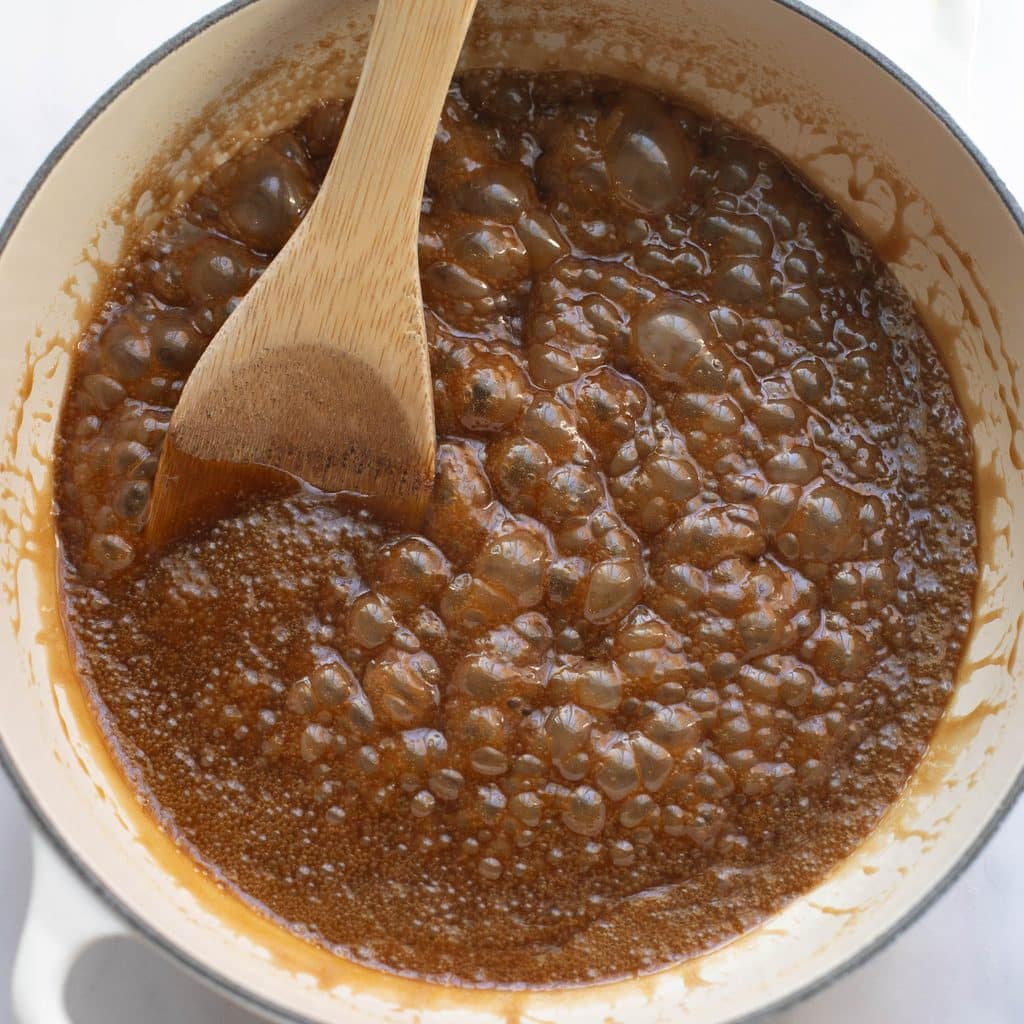 caramel bubbling in a saucepan