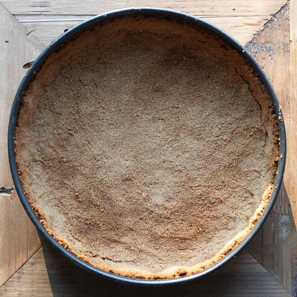 graham cracker crust in a springform pan