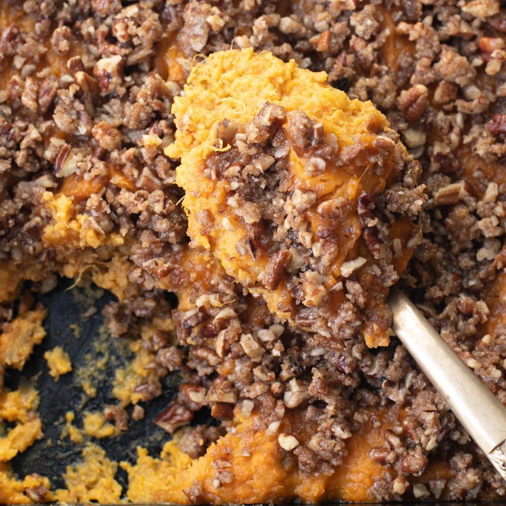 a large serving spoonful of sweet potato casserole